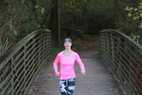 Assistant Principal Natalee Thompson runs in Hickory Hill Park