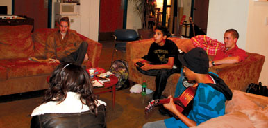 The hangout room at UAY is where teenagers can hang out, play video games, strum guitars, play foosball and spend time with friends.