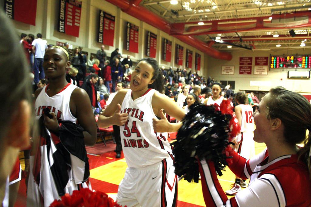 Virginia Johnson celebrates the teams victory over Prairie last Friday.  Photo by Annelise Jacobson.