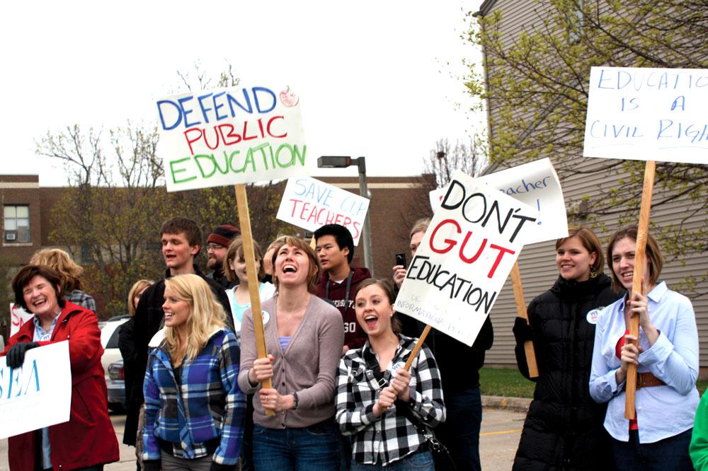 Protesters+yell+Save+our+schools+during+a+rally+at+the+CAO+on+Monday%2C+April+18.