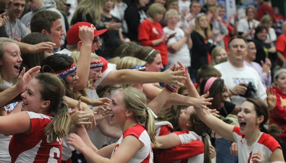 The+Red+Zone+celebrates+with+the+players+after+beating+Ankeny.++Photo+by+Annika+Wasson.