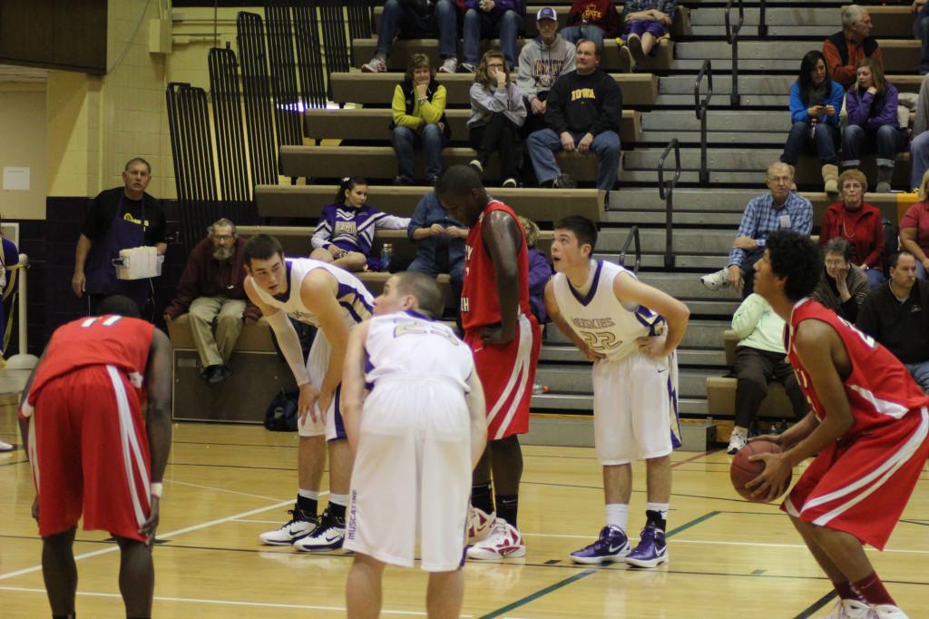 Jerel Moore attempts a free throw during City Highs victory over Muscatine.  Photo by Tristan Spears