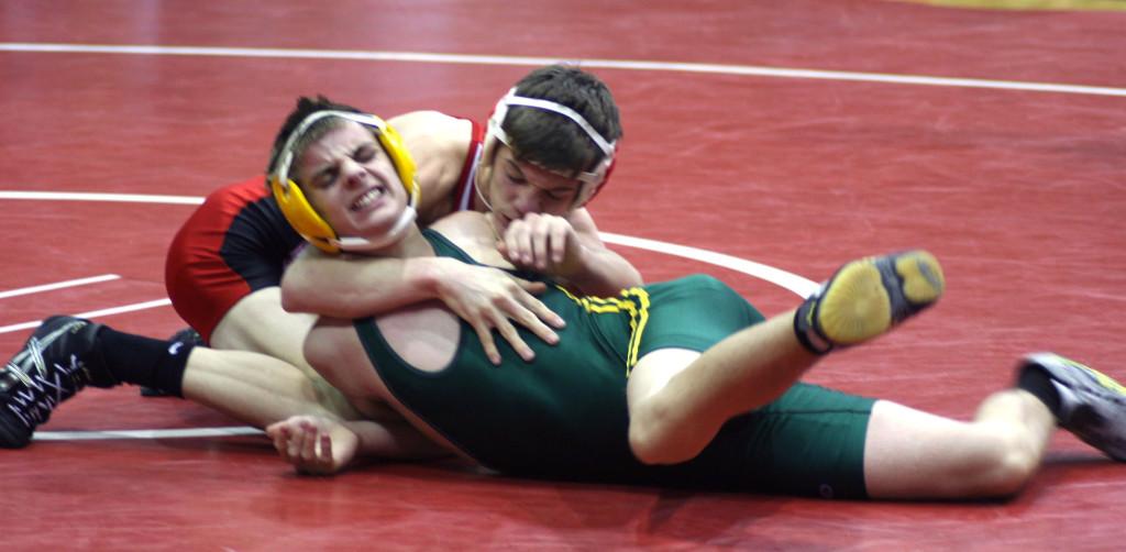Evgeney Kolyvanov wrestles his way to victory at the CR Kennedy Triangular Duel Meet Thursday.