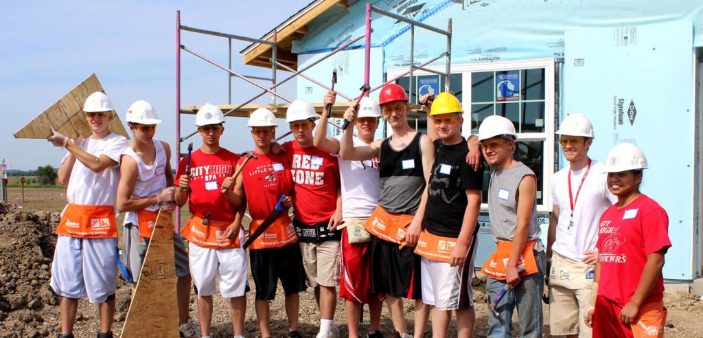 Seniors help out with Habitat for Humanity on their last day.  Photo by Jon Myers