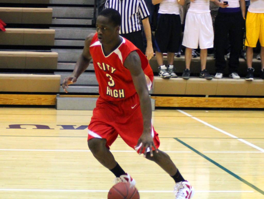 Lonnie Chester 13 makes a drive during the City-West game last season.  