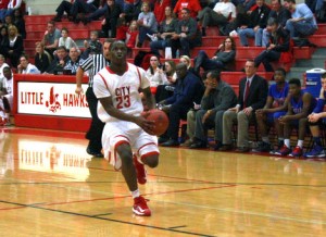 Lonnie Chester 13 drives to the basket during a non conference game earlier this season. Photo by Lily Howard