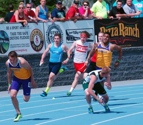 K. Butler sprints the 4x100 meter dash at State alongside Chuck Riley '11, Cory Lindsey '12, and Bryson Runge '11. The team finished in fourth with a time of 42.52.