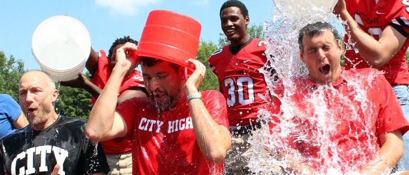 City HIgh Administration Staff gets splashed by students during the Fall Pep Assembly.