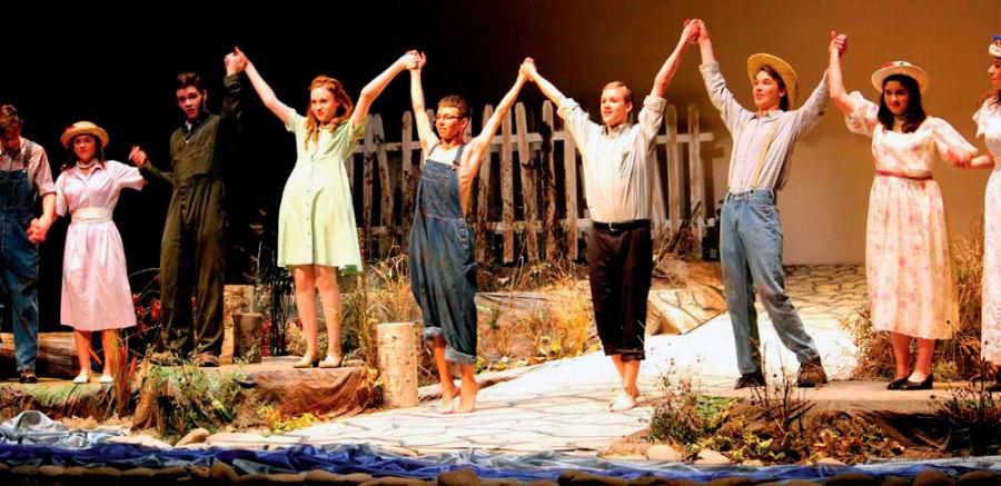 The cast of the Diviners accepts a standing ovation at curtain call