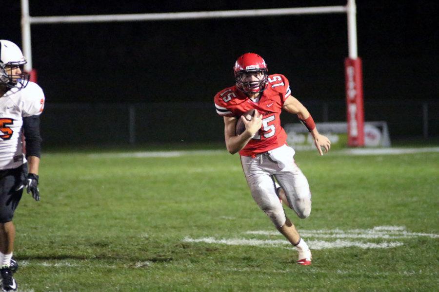 Nate Wieland 17 rushes toward the Red Zone