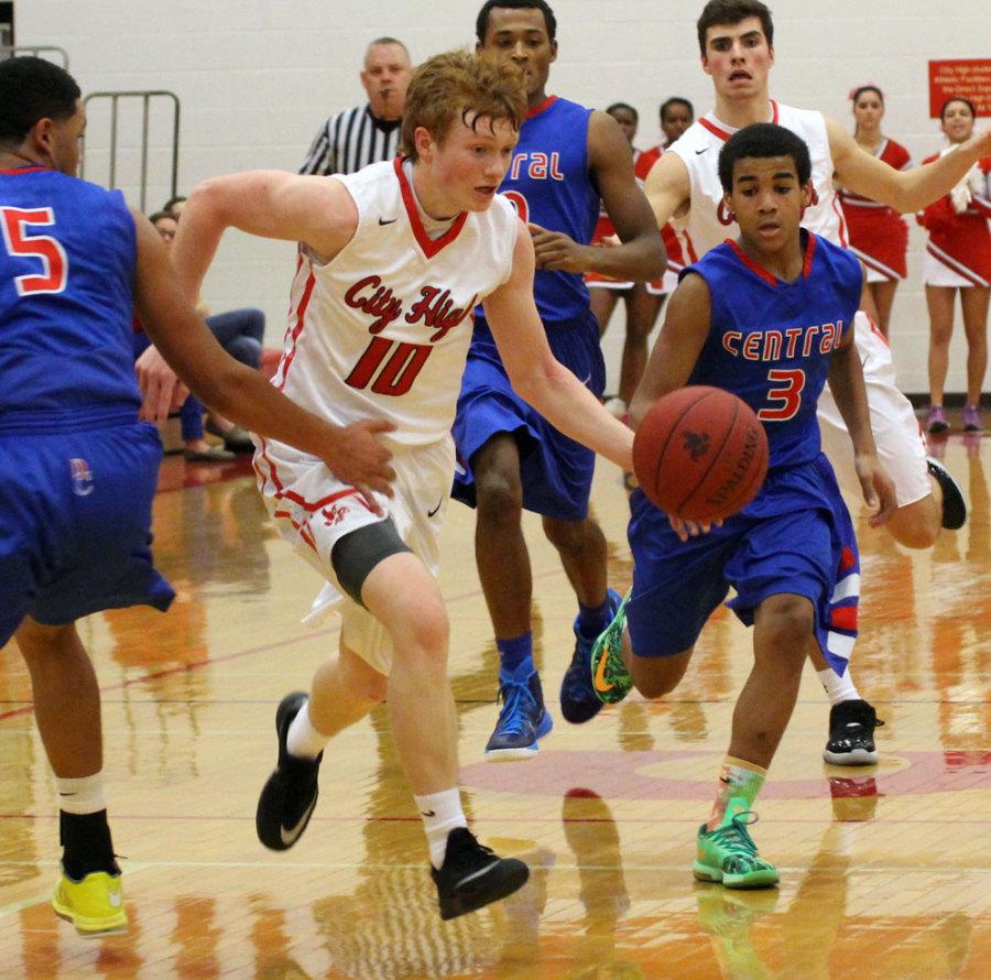 Henry Mulligan pushes through players