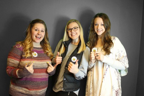 Dacey Messinger '15, Lillie Christopherson '15, and Emma Pradarelli '15 all took the pledge and got their buttons.