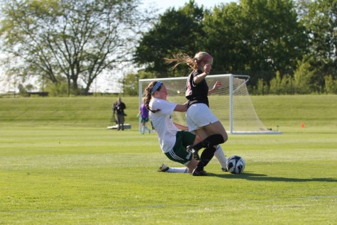 Maddie DePrenger '16 blows by a West High defender