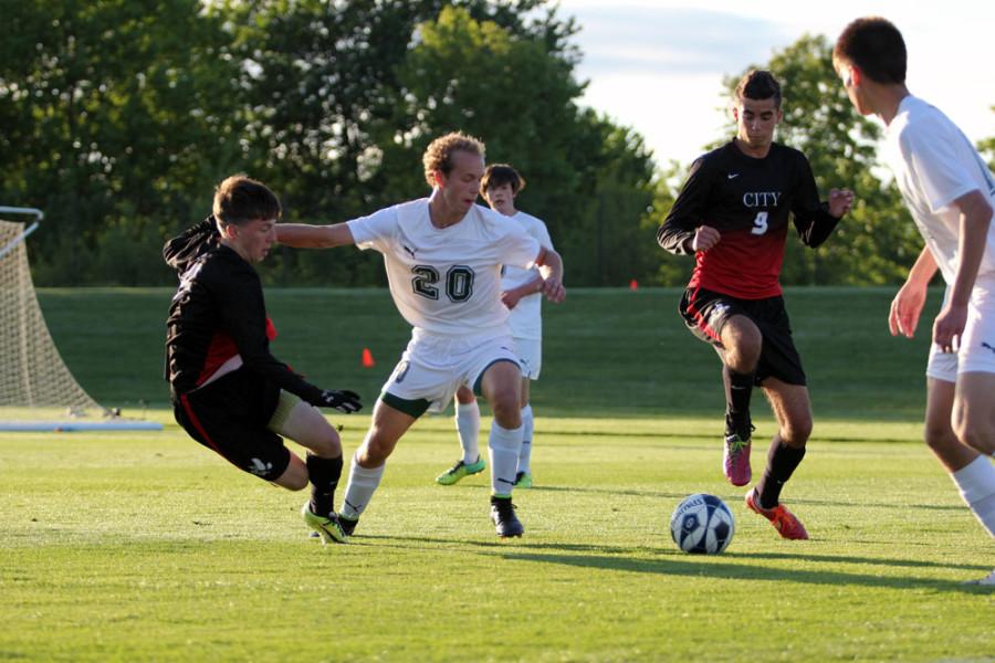 Victor+Brown-Rodriguez+16+weaves+between+two+West+defenders