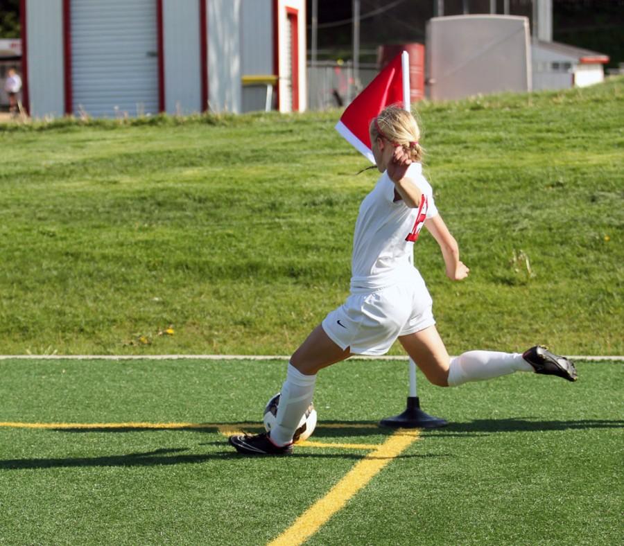 Maddie Deprenger 16 takes a corner kick during a game in 2015. 