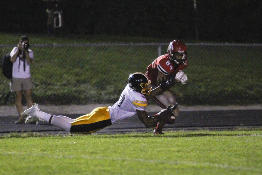 Jason Jones 16 is brought down by a Bettendorf defender.
