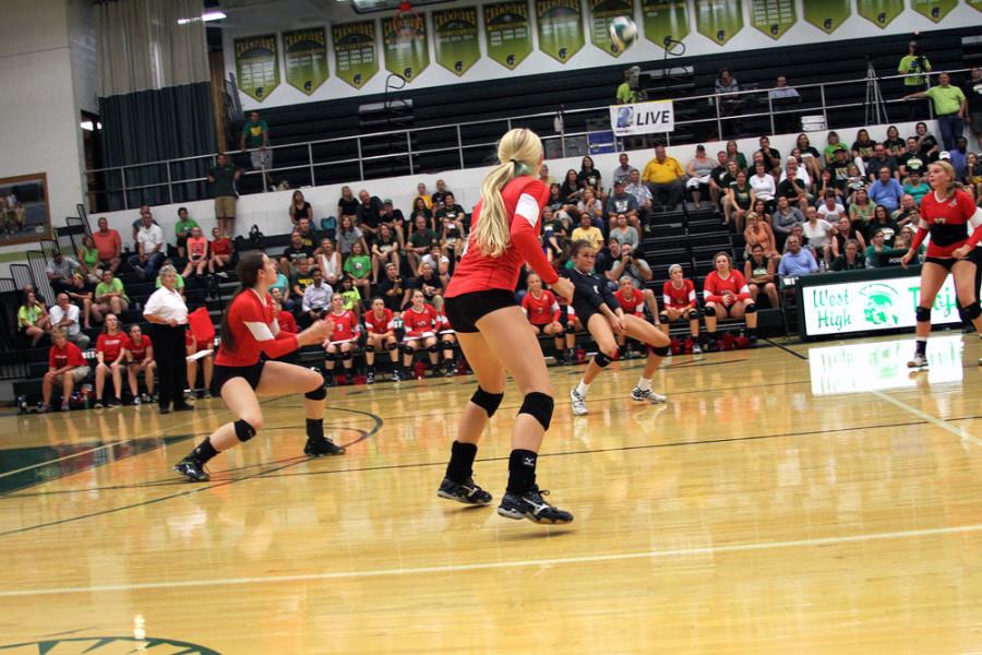 Libero Ashley Smith 16 saves a spike against West.