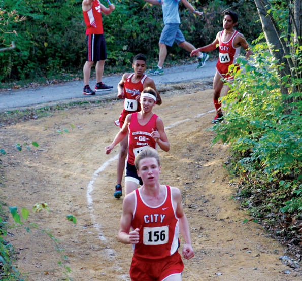 Ry Threlkeld-Wiegand 19 and Russell Martin 16 running in the State Cross country meet
