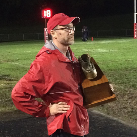 Coleman standing on the sideline as the clock counted down resulting in the return of the Boot to City High's trophy case.