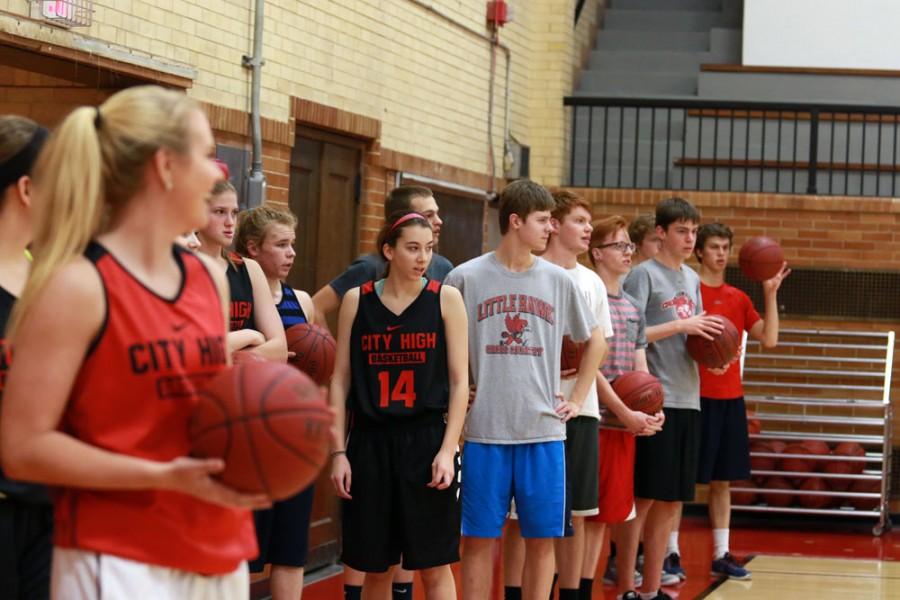 The self titled, Girls Basketball Boys Cross Country Scrimmage Squad lines up prior to a drill.