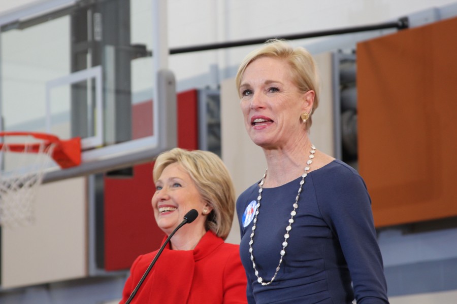 Hillary Clinton and Cecile Richards smile at the crowd.