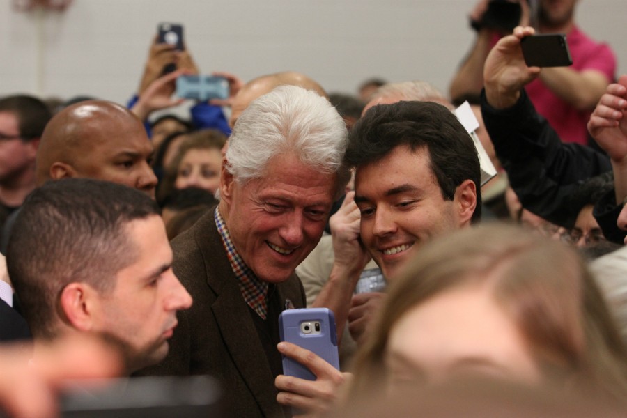 President Bill Clinton wraps up the night with a selfie with a supporter. 