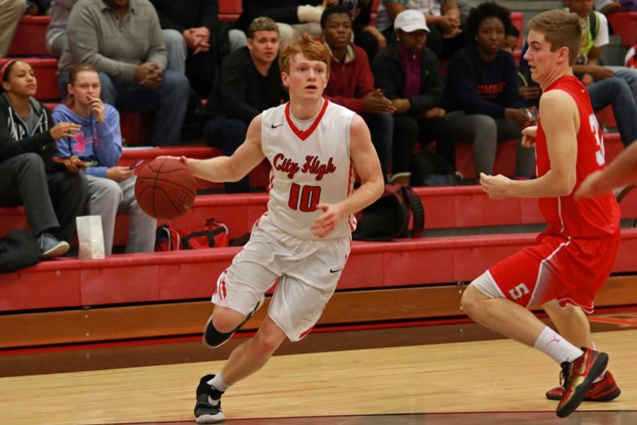 Henry Mulligan 16 drives towards the hoop on Tuesday, February 16th, 2016.