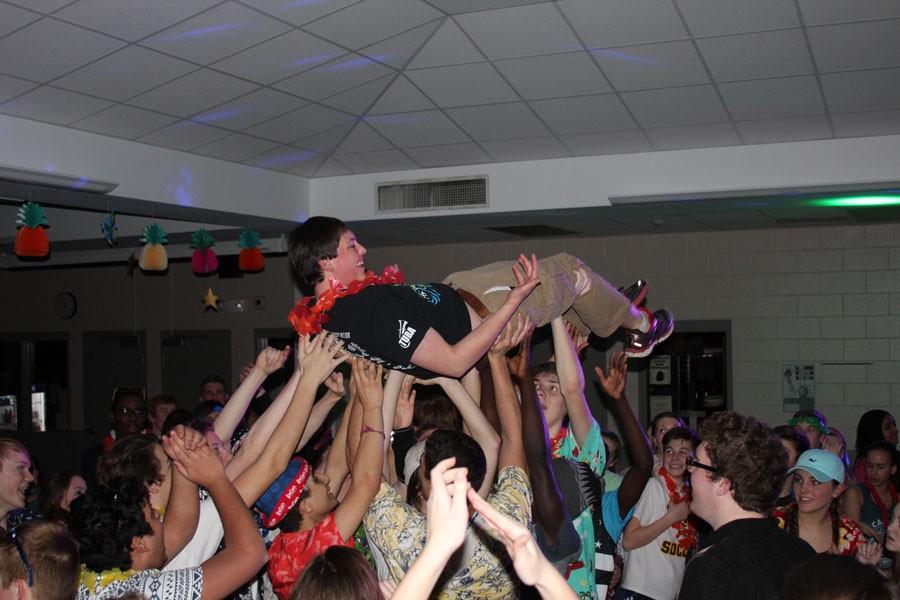 Jonathan House 17 is lifted up by students during last years City High Dance Marathon.