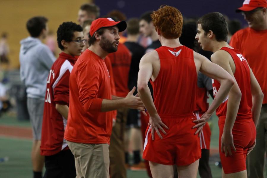 A City High track coach talks to his runners after the 600 meter run on Monday, March 14th, 2016.