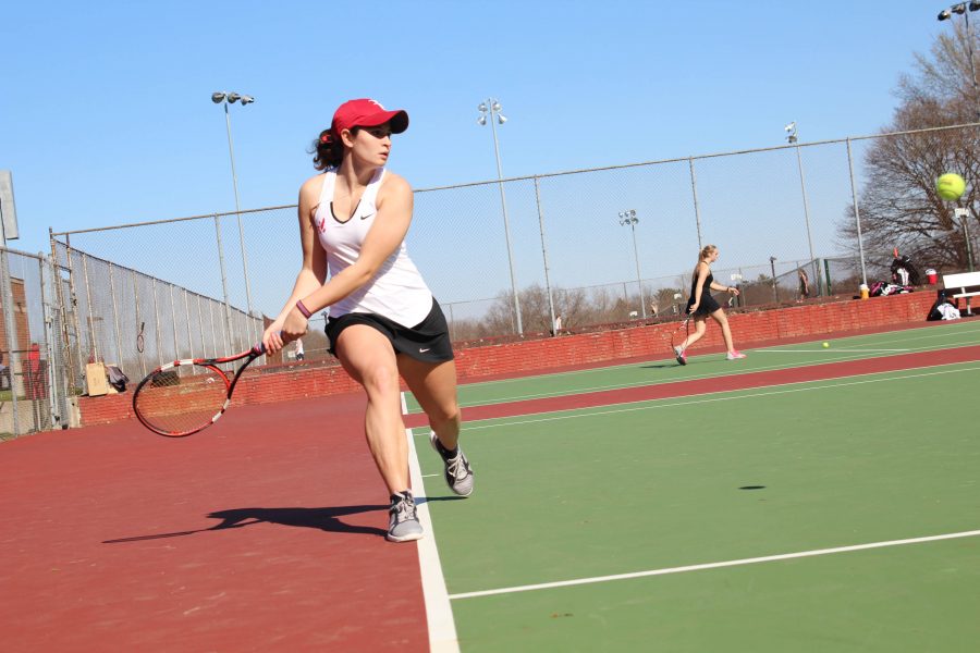 Innes Hicsasmaz 16 reaches for a backhand in her match against Linn Mar