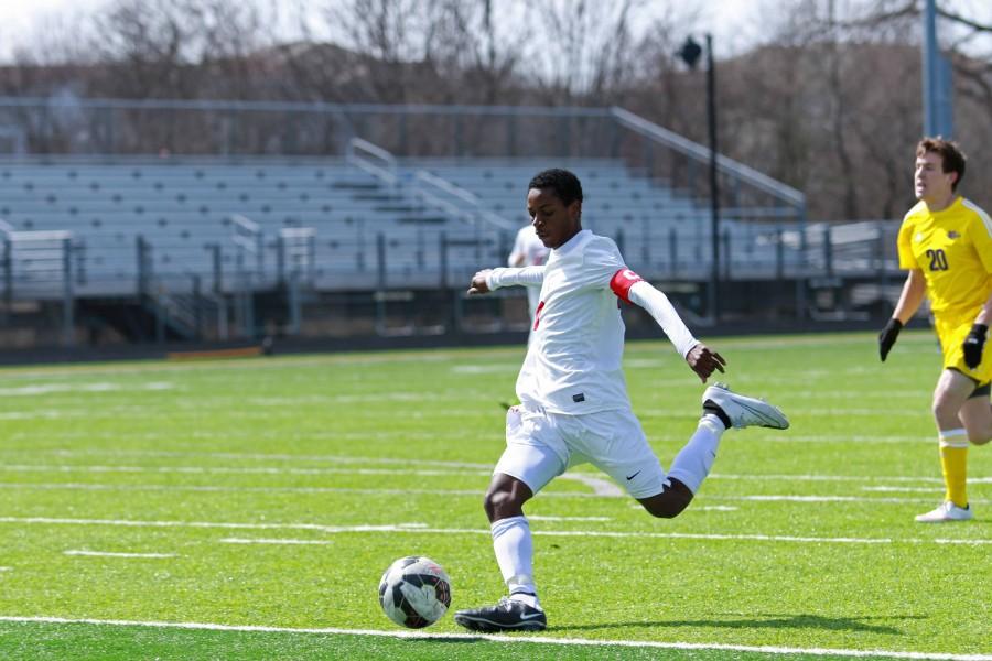 Gaby Baloci 16 swings his leg back before sliding into the ball scoring the second goal of the morning for the Little Hawks.