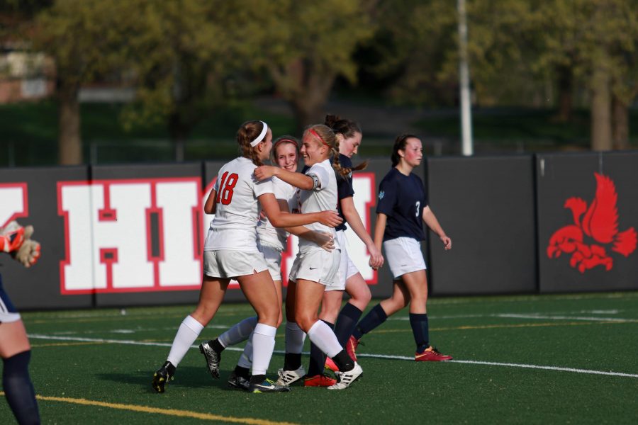 Teammates celebrate with Grace Brown 17 after her goal in the 39th minute in the first half on April 26th, 2016.
