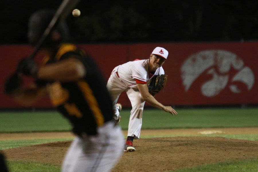 Dominick Whitlow '17 throws a pitch in the 7th inning during the Little Hawks' game against the Bettendorf Bulldogs on Wednesday, June 1st, 2016.
