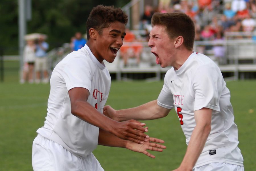 Henry Mosher 16 screams after scoring against West Des Moines Valley before half during the Little Hawks state championship game at the Cownie Soccer Park on Saturday, June 4, 2016.