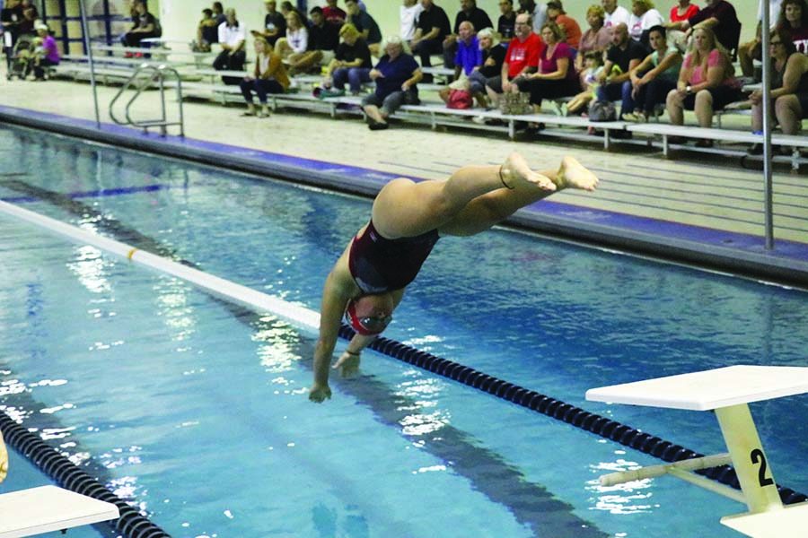 Captain Devan ORourke 17 hears the buzzer and dives into the water.