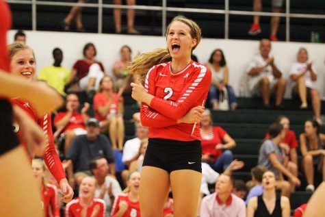 Sydney Schroeder 17 is filled with emotion after a crucial point against the Trojans. 