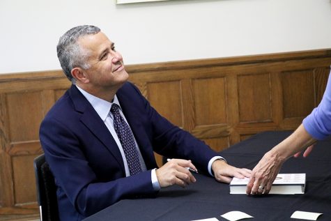 CNN Legal Analyst and New Yorker Columnist Jeffrey Toobin signs copies of his novel, American Heiress, on September 15th after his lecture concerning the history and current role of the Supreme Court in American politics.
