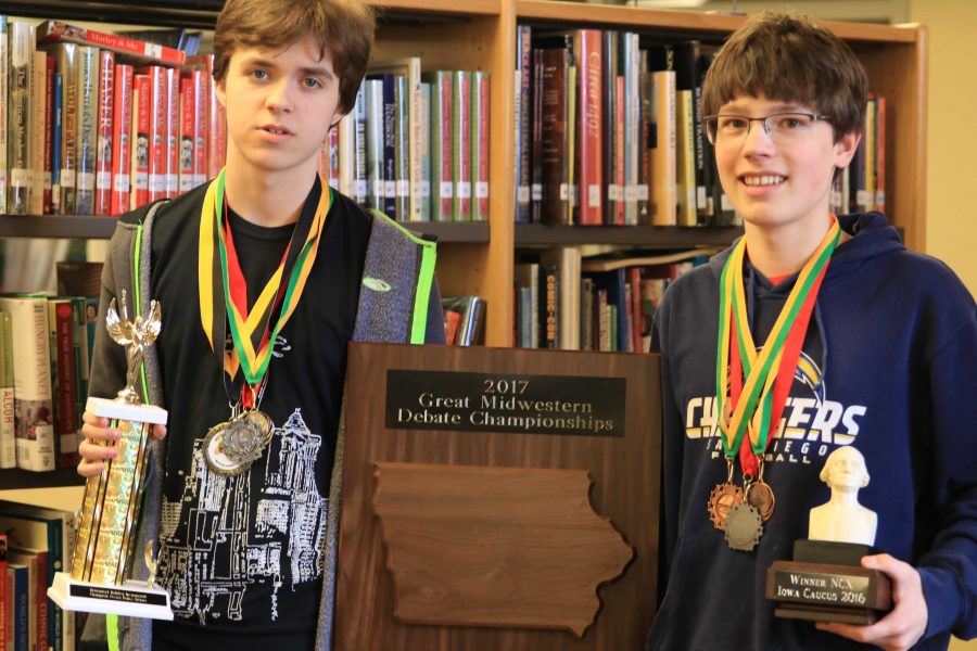 Rhys Holman 20 and Simon Weiss  20 pose with their debate awards.