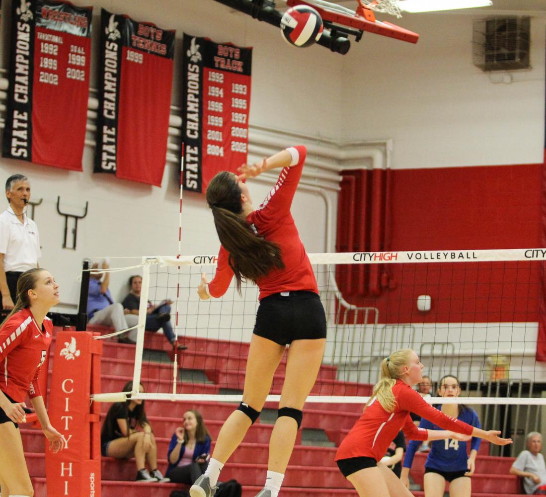 Ellie Evans 19 aims for a kill during the Little Hawks match versus Cedar Rapids Washington on September 26th. 