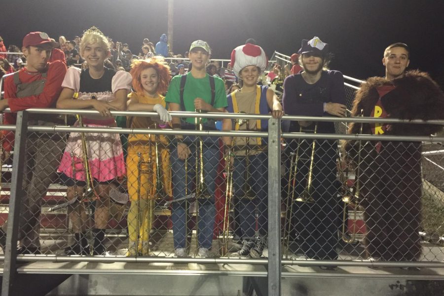 The trombone section dresses as characters from Mario