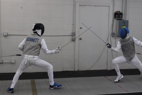 Joseph Bennett 20 duels with a fellow fencer at the Iowa City Fencing Club where they train.
