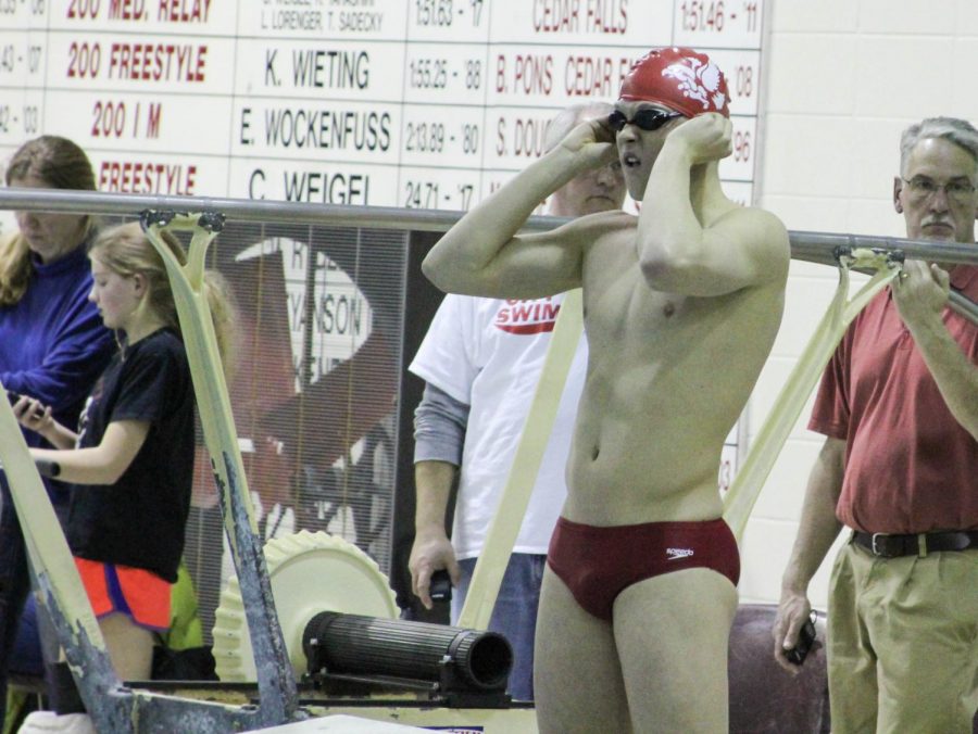 Forrest Frazier 20 getting ready to swim his 100 fly
