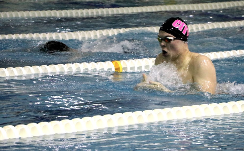 Ivan Johnson swims the 100 breast during the Little Hawks dual against Cedar Falls.