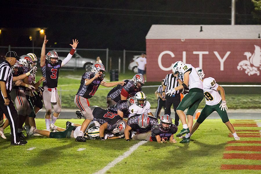 Max DePrenger 19 scores the go-ahead touchdown with some help from the offensive line.