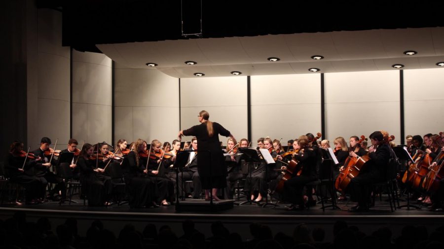 Mrs. Stucky conducts the Symphony Orchestra