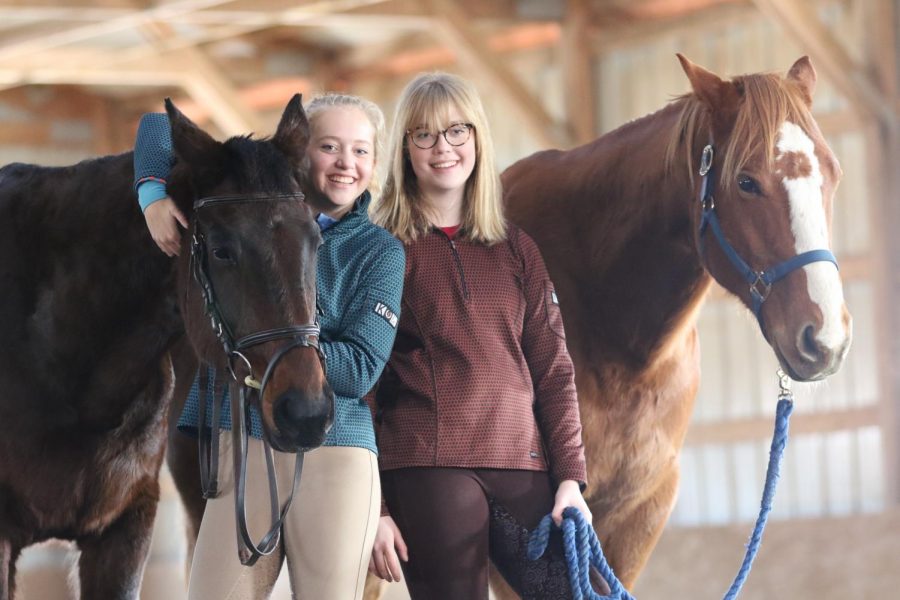 Alex 20 and Rachel Marsh 22 with the horses they call friends.