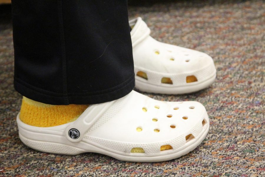 Emma Altemeier ‘22 wearing white Crocs. 

“I wear them like every day. I bought these as a Christmas gift because theyre comfortable. Because it’s winter, I feel like not a lot of people wear them, so I guess its a bold move. I also have different colored Crocs in pink and yellow. I started wearing them before they became a trend. I started wearing them for softball because some of my teammates wore them. So [I] was just like, ‘Why not?’”
