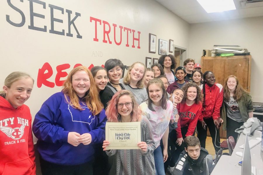 Little Hawk reporters hold their IHSPA News Team of the Year Finalist Award