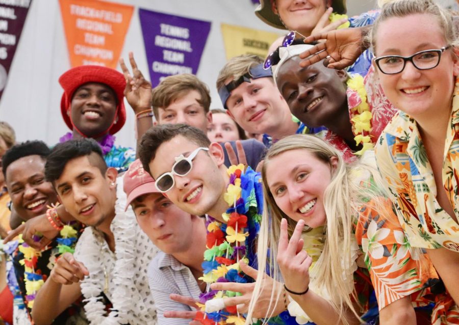 The City High student section dressed in beach attire as the cheered on the volleyball team.