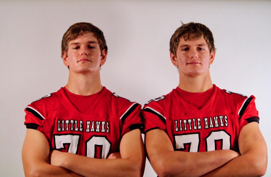 Ethan Goodrich 22 and Avery Goodrich 22 pose for a weekly football photoshoot.